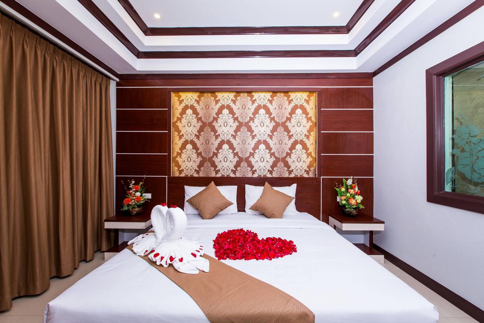 Deluxe Room - קופיפי אנדמן ביץ' ריזורט | Phi Phi Andaman Beach Resort - תמונה ראשית