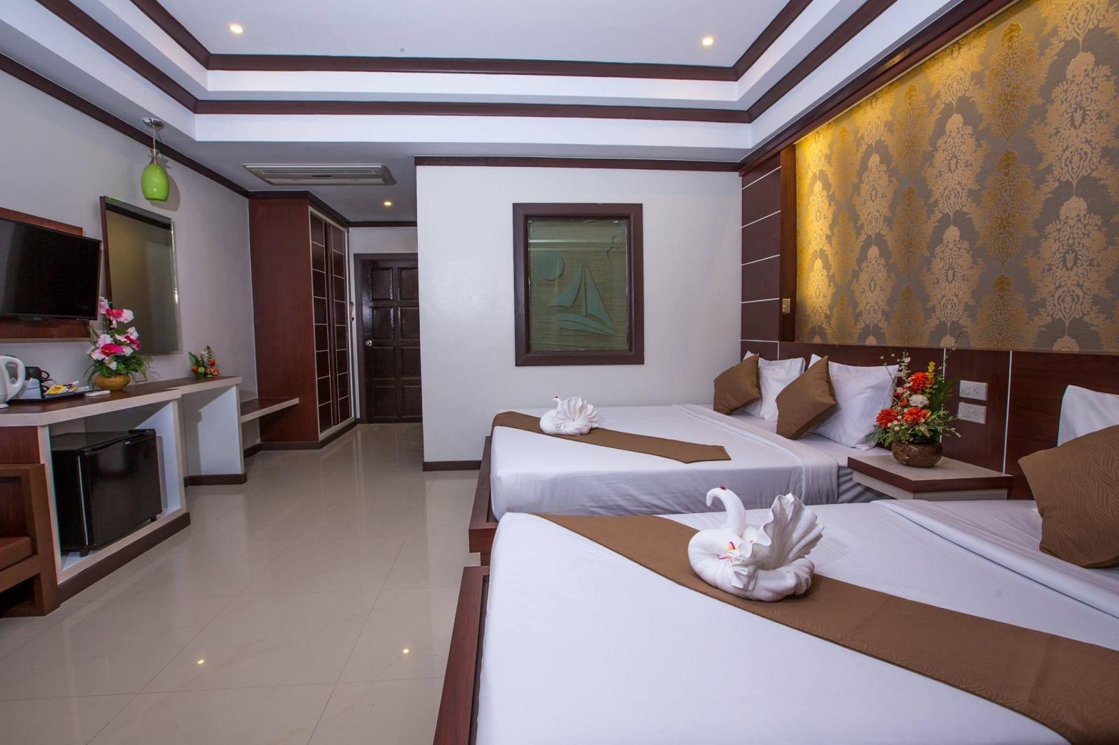 Deluxe Triple Room - קופיפי אנדמן ביץ' ריזורט | Phi Phi Andaman Beach Resort - תמונה ראשית