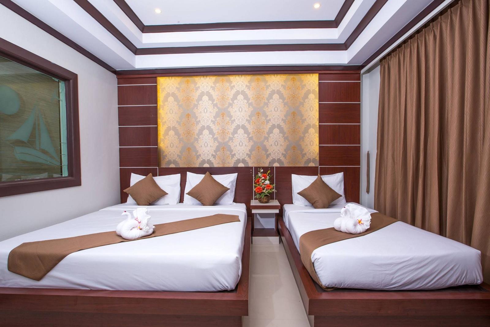 Deluxe Triple Room - קופיפי אנדמן ביץ' ריזורט | Phi Phi Andaman Beach Resort - תמונה 2